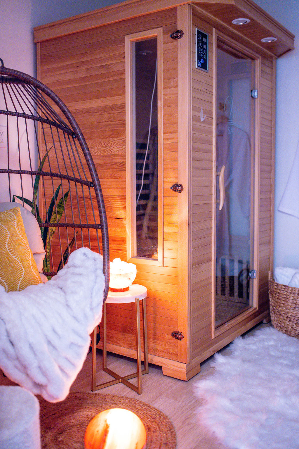 cozy relaxing Serenity Suite with Infrared Sauna, Red Light LED Therapy, pink Himalayan salt lamps at Me Time Botanicals