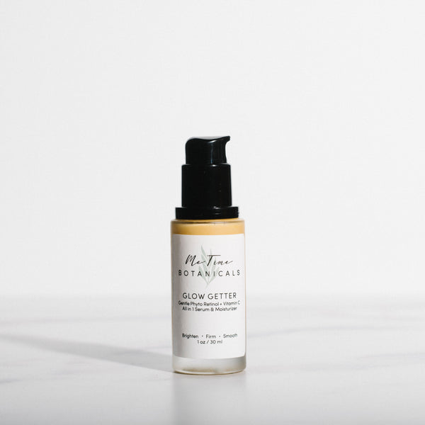 Skincare bottle labeled 'Glow Getter' on a white background