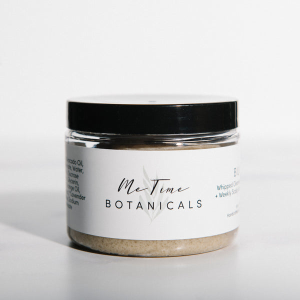 Jar of 'BUFF' body scrub with a white label on a white background
